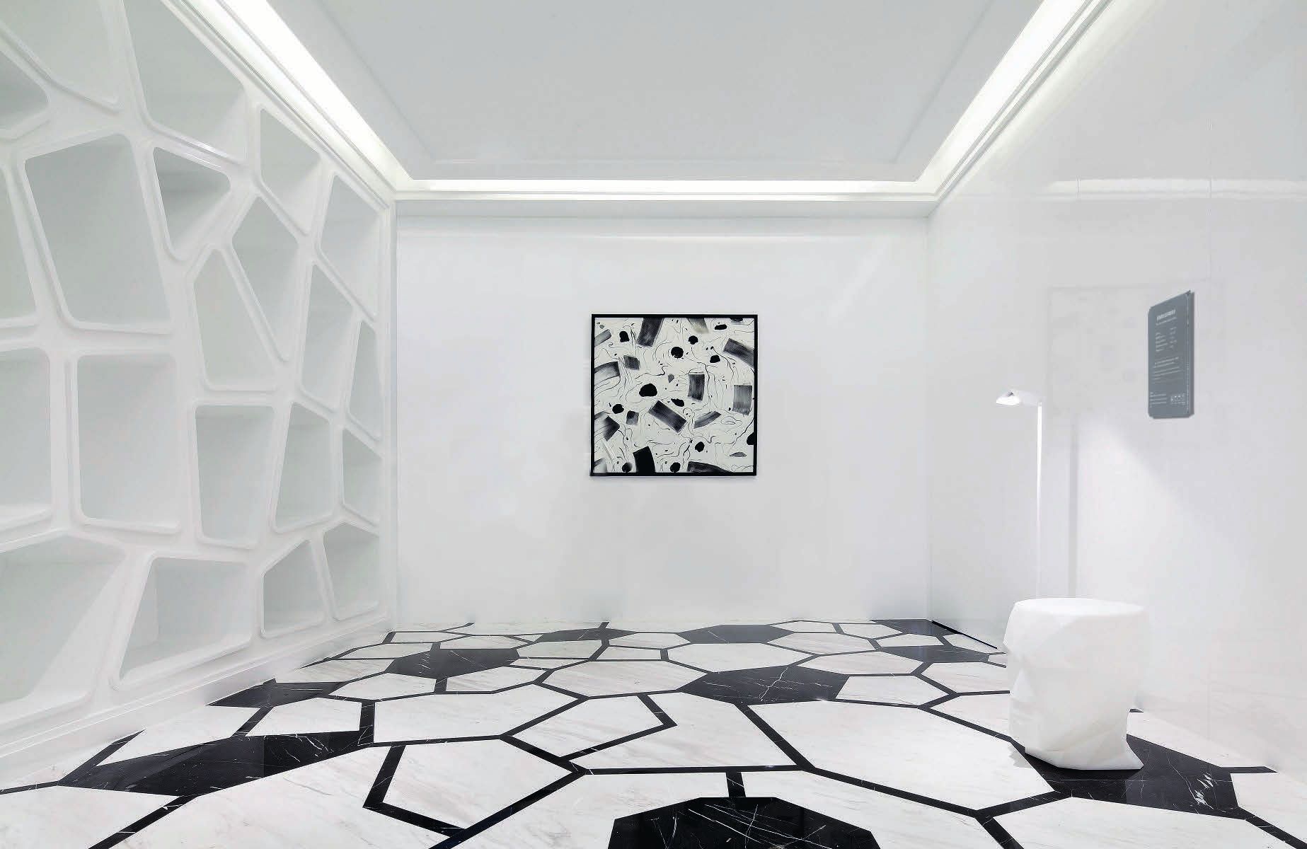 A white room with no visible speakers, where E300 panels are plastered into the walls